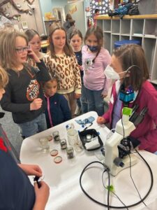 Christine introduces 2nd graders to soil microbes.